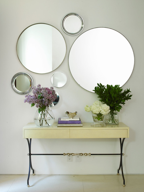 Hang multiple mirrors for a dramatic look